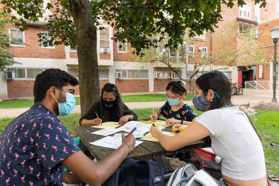 CMU students sitting around a picnic table